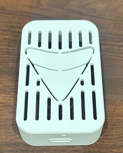 Shark tooth decorative downspout cover, ocean-inspired gutter spout design for beach houses from Coastal Spouts.